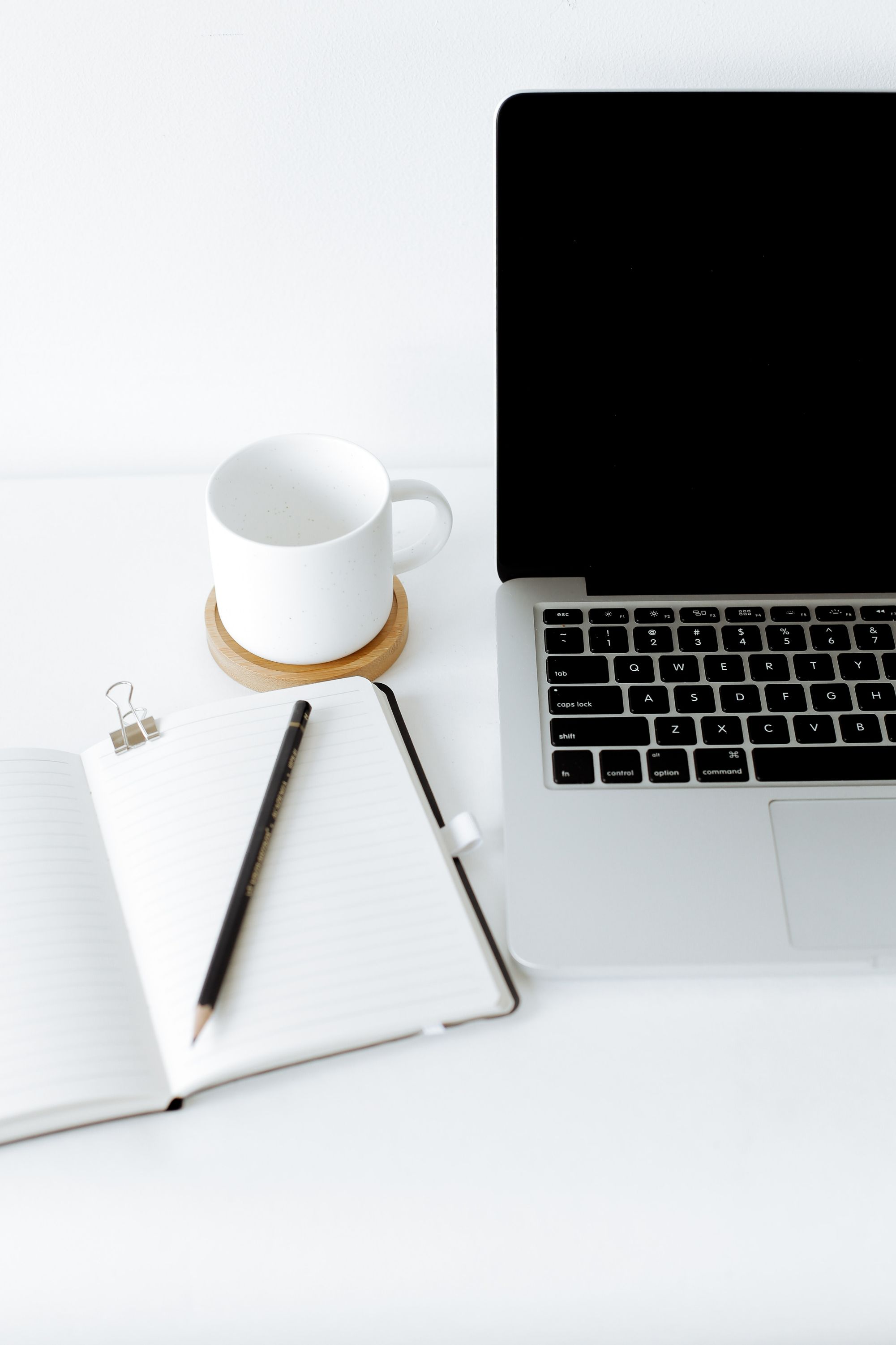 Laptop and coffee cup on a table