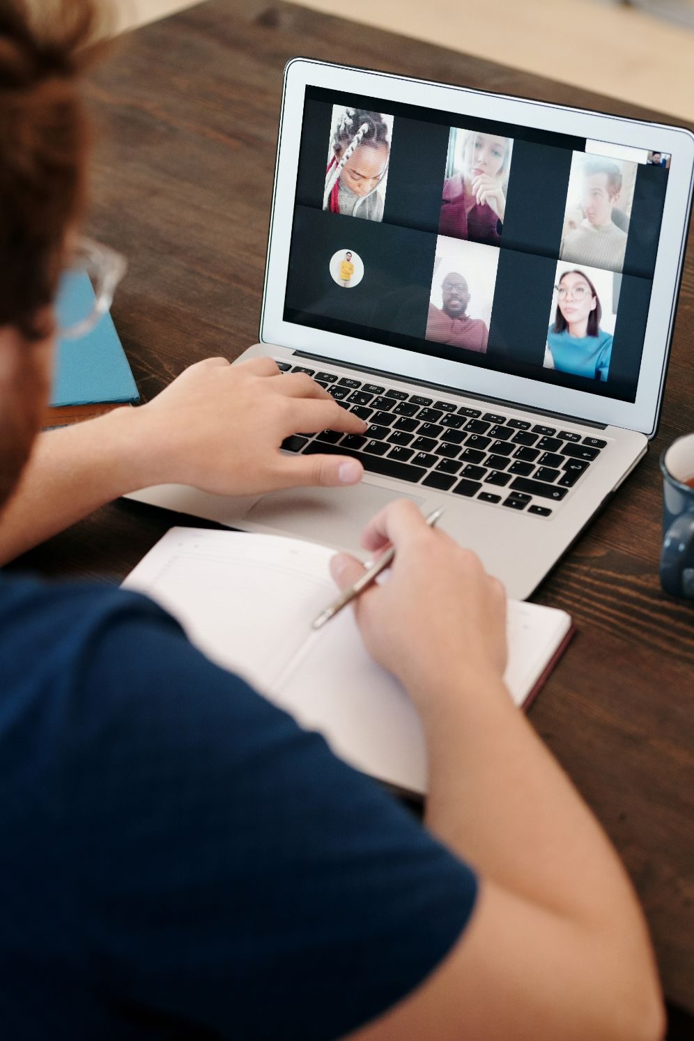 Person on a virtual meeting via laptop 