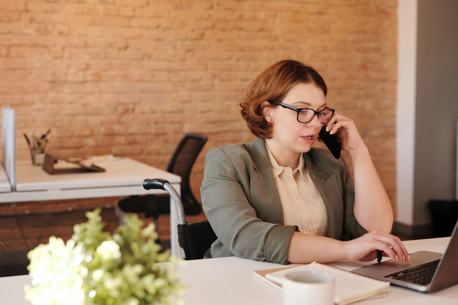 person talking on the phone in an office