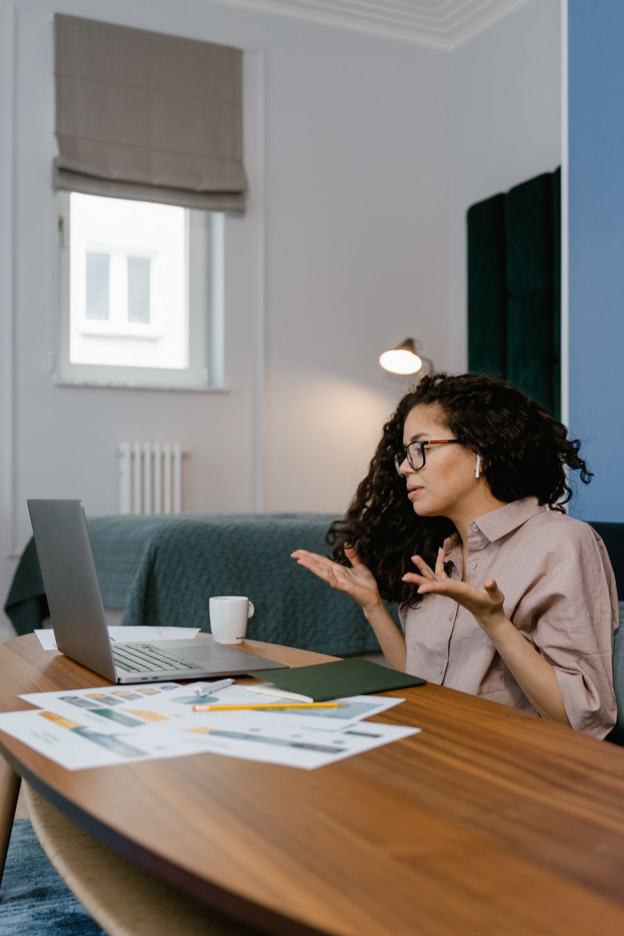 Woman talking on a call on a computer