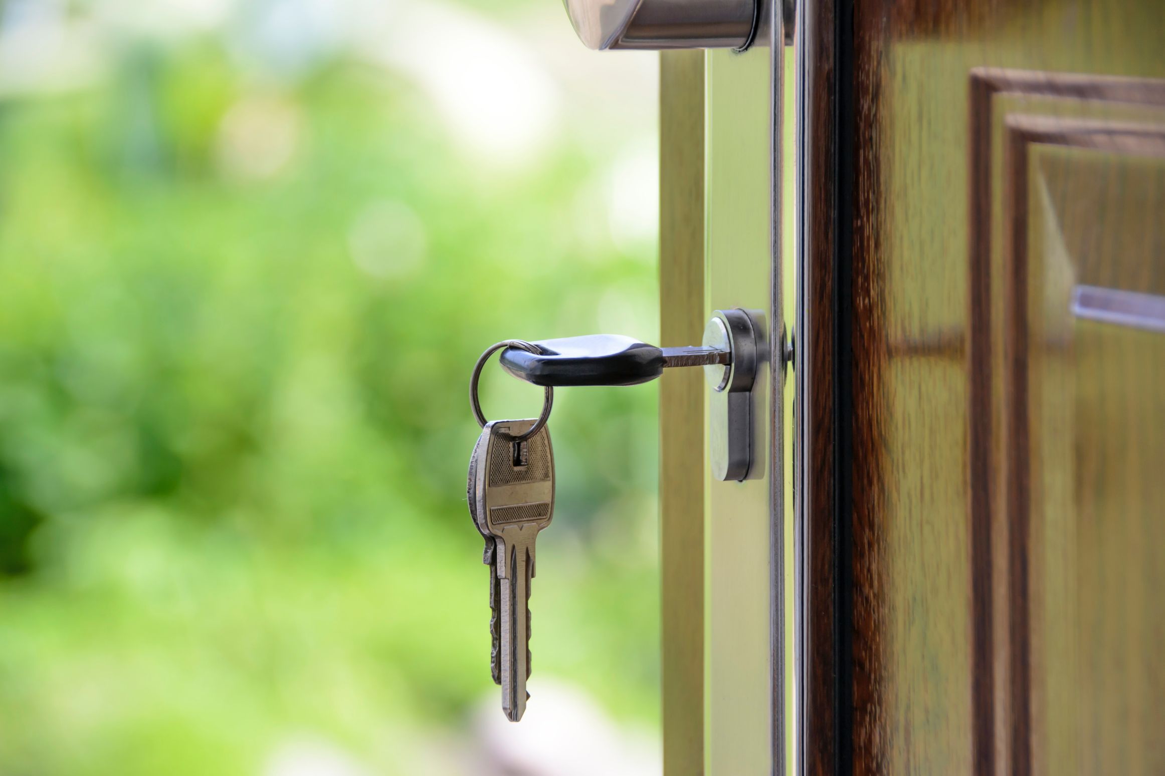 Key hanging out of a key hole