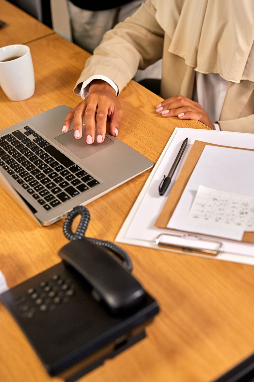 Laptop and phone on office desk