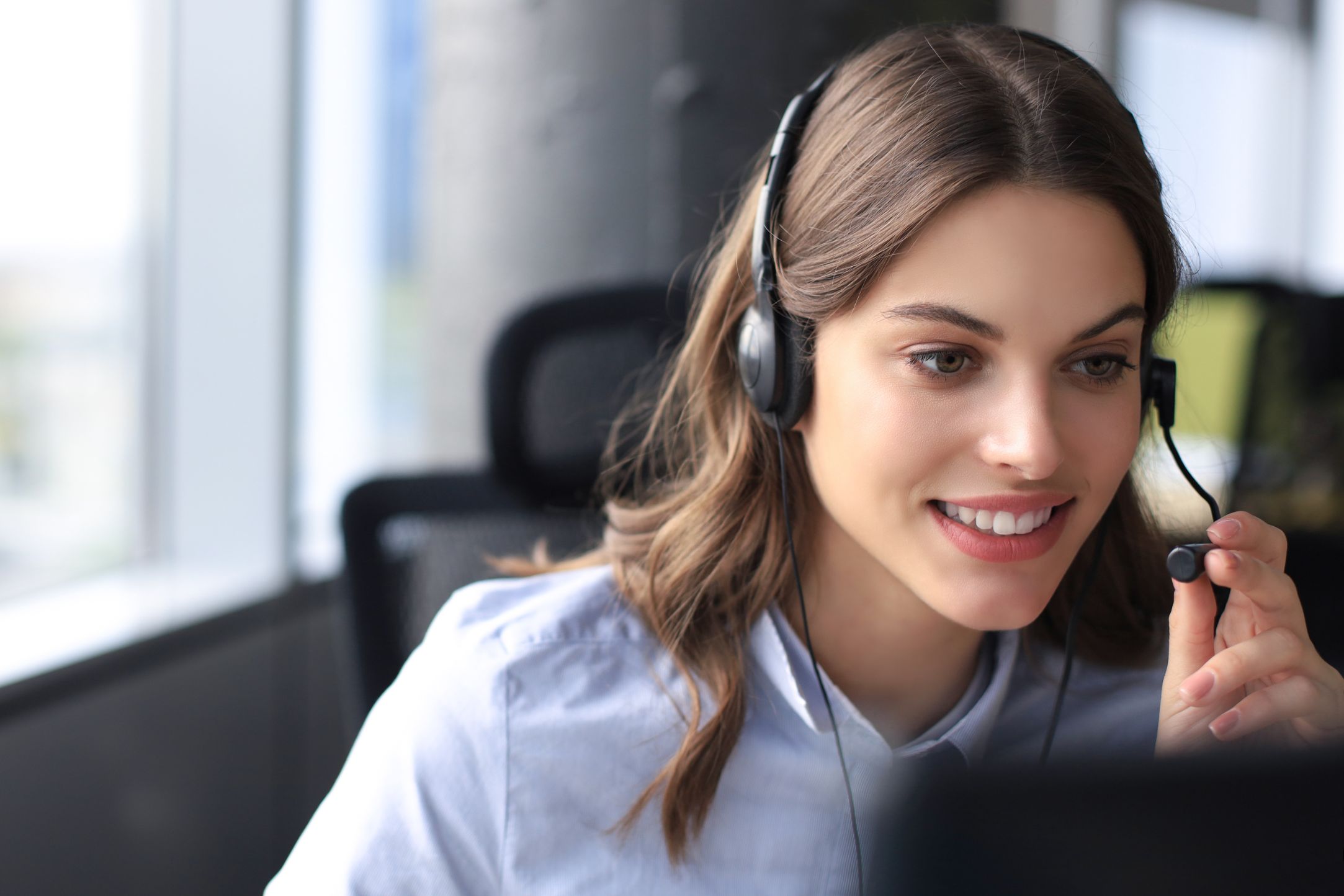 Calling agent talking on a headset