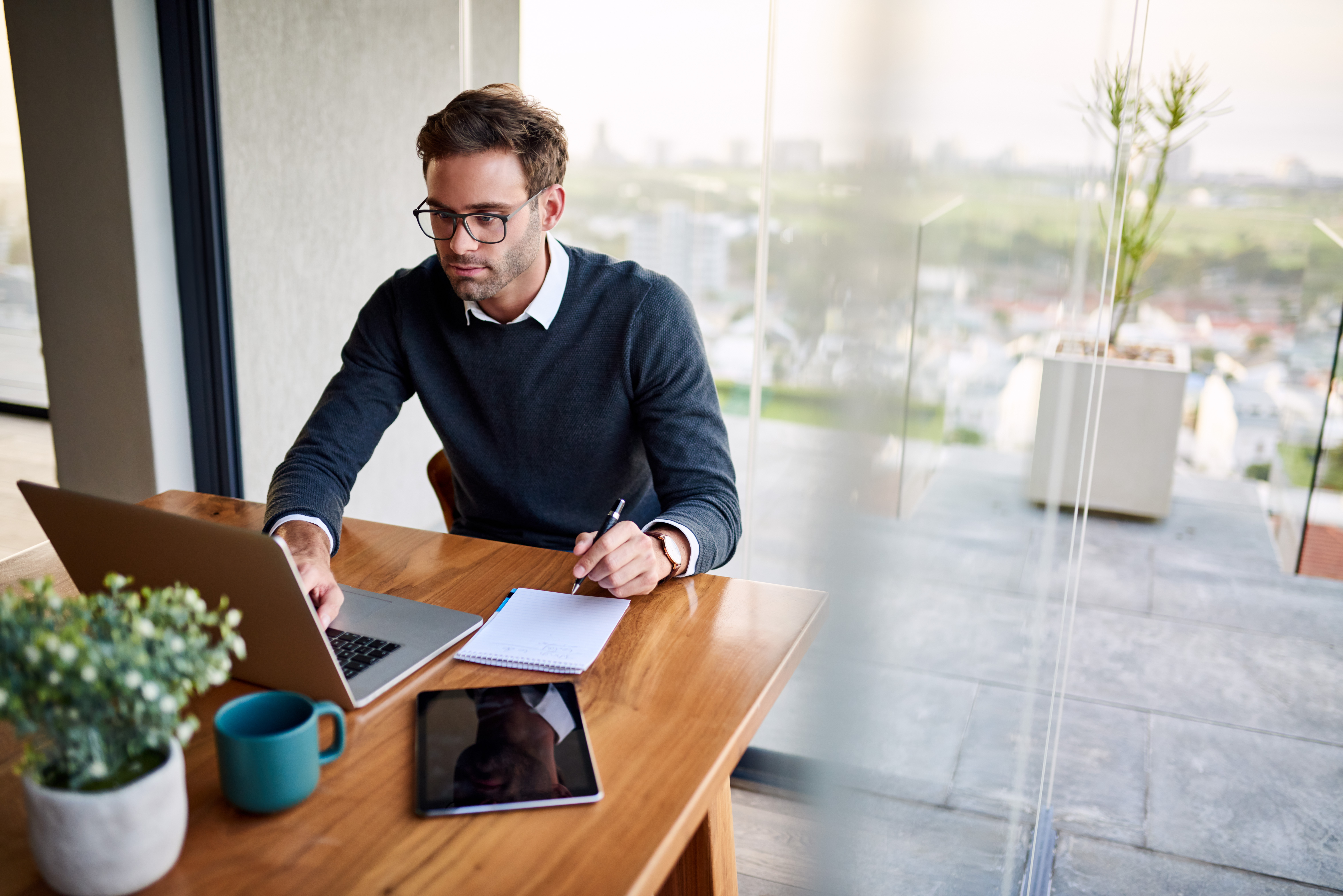 Business man working on computer at a desk