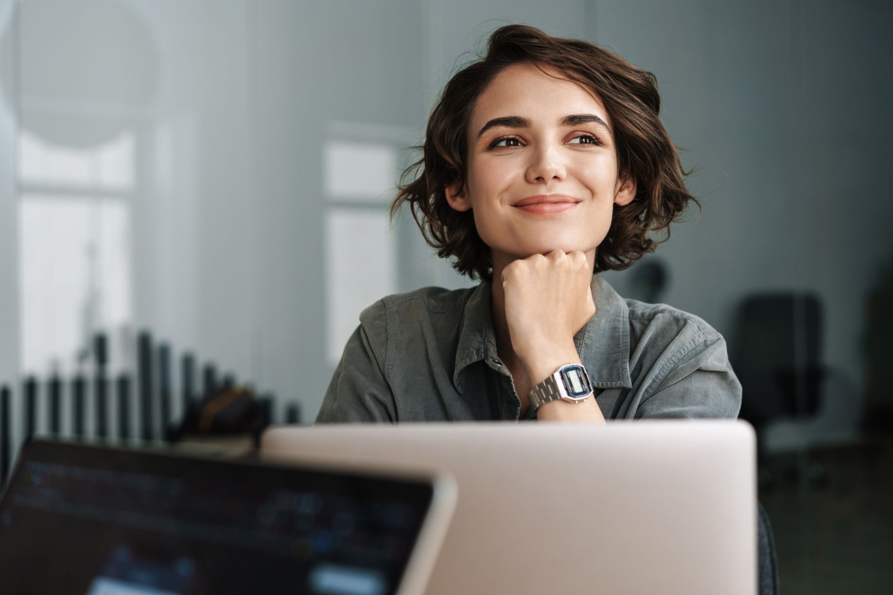 Business woman working on computer at a desk