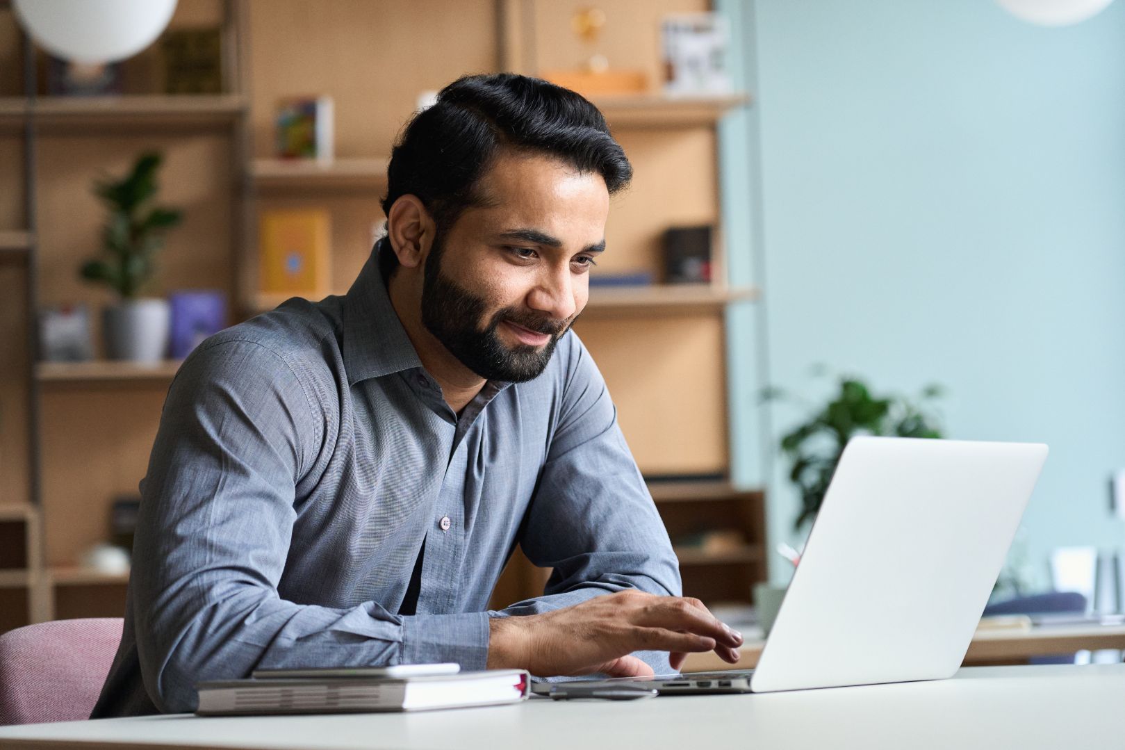 Business man working on computer in an office