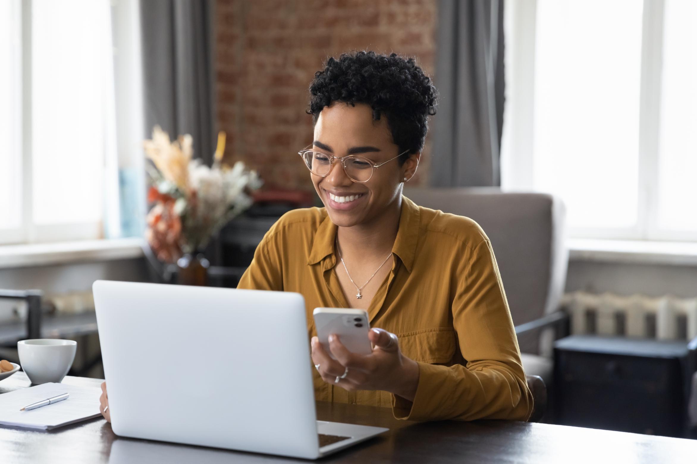 Business woman working on computer at a desk