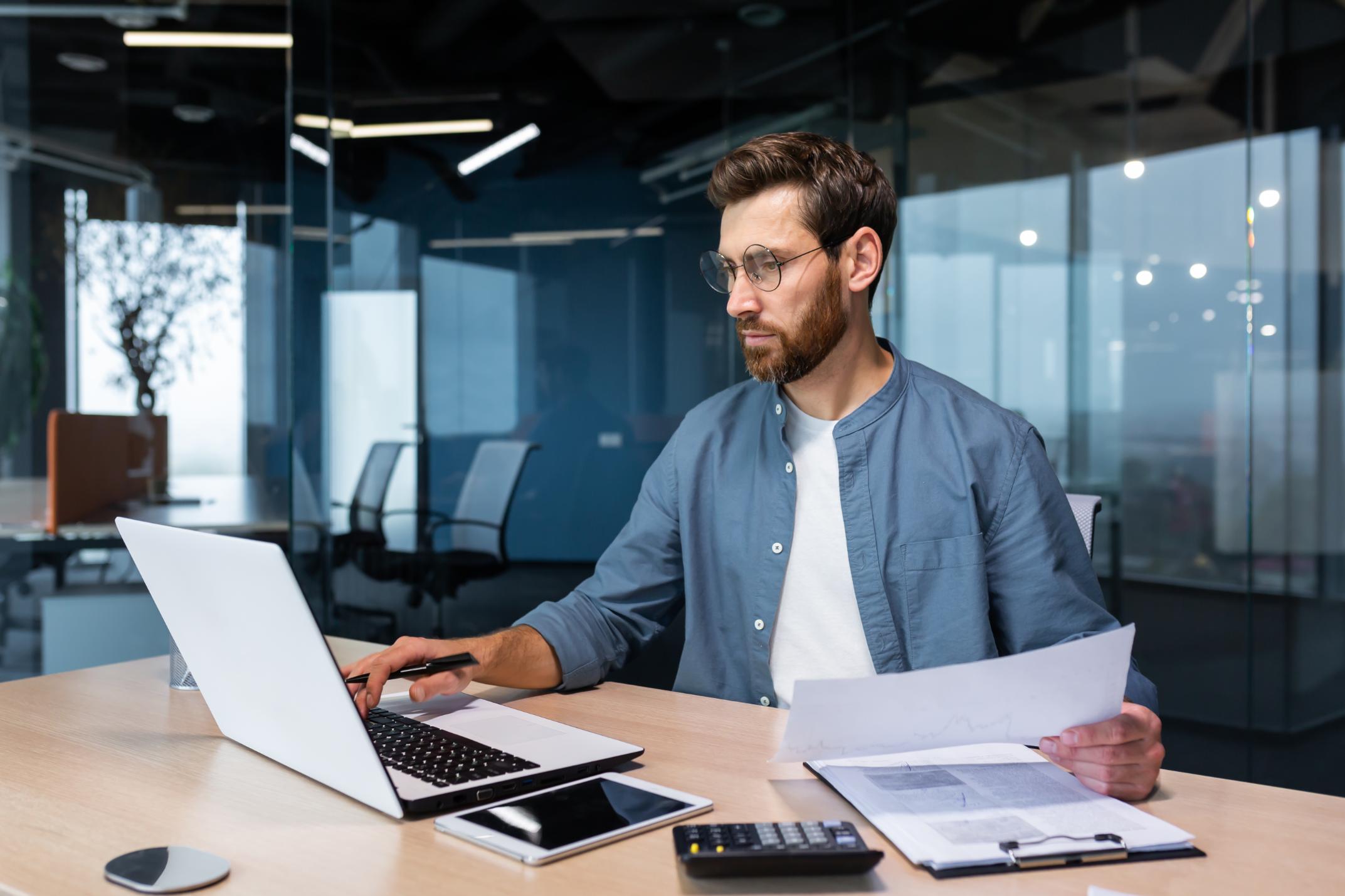 Business man working on computer at a desk