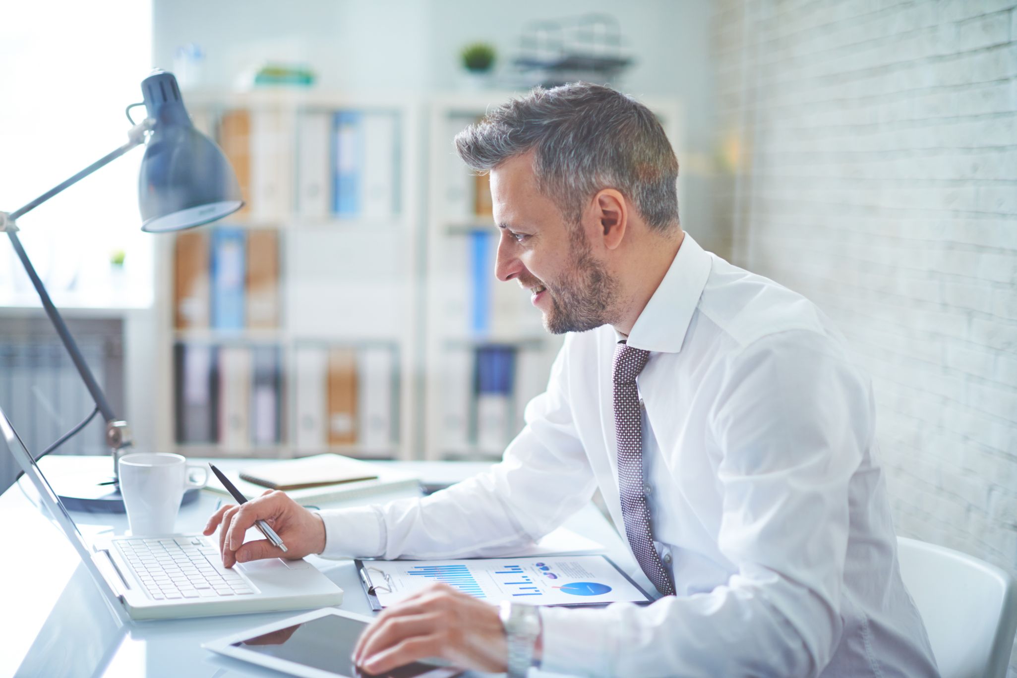 Business man working on computer at a desk