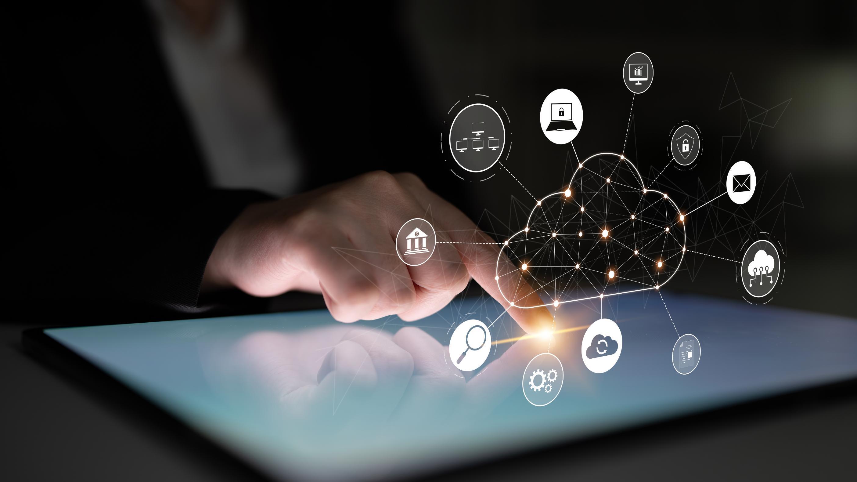Person pointing on a tablet with network graphics over the image
