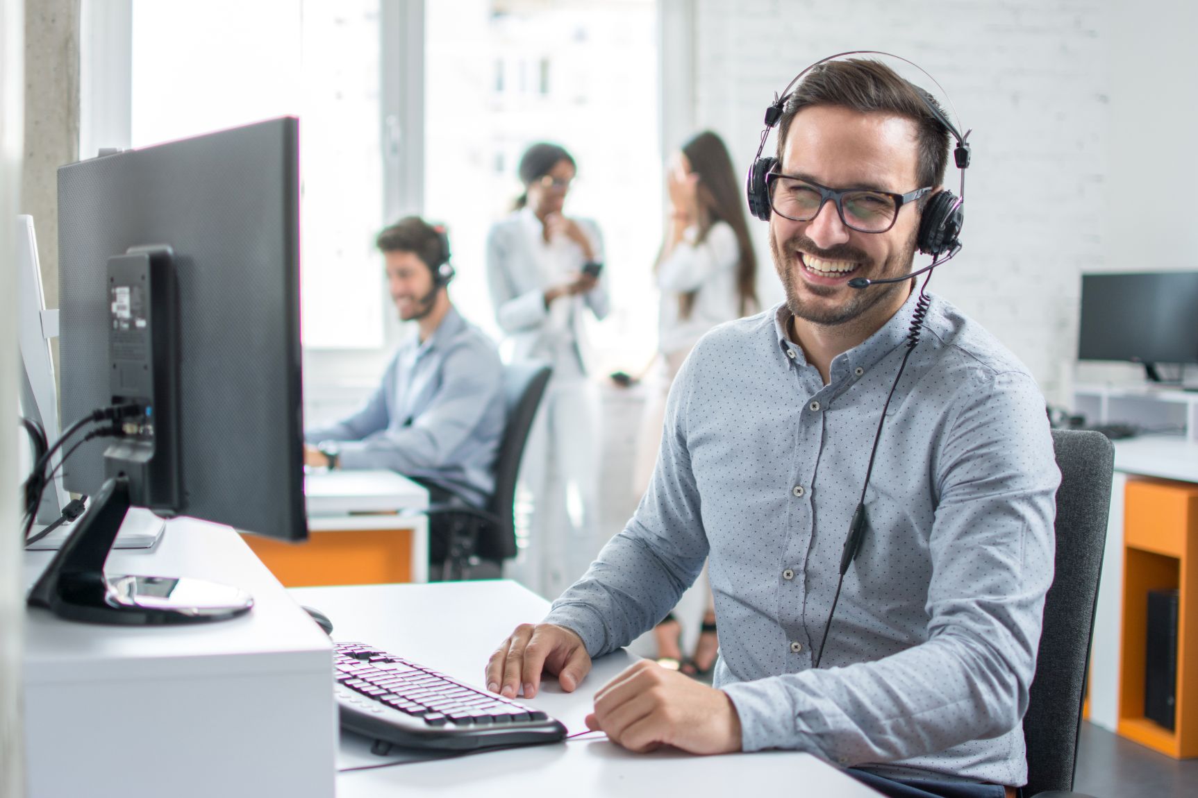 Man talking on headset phone